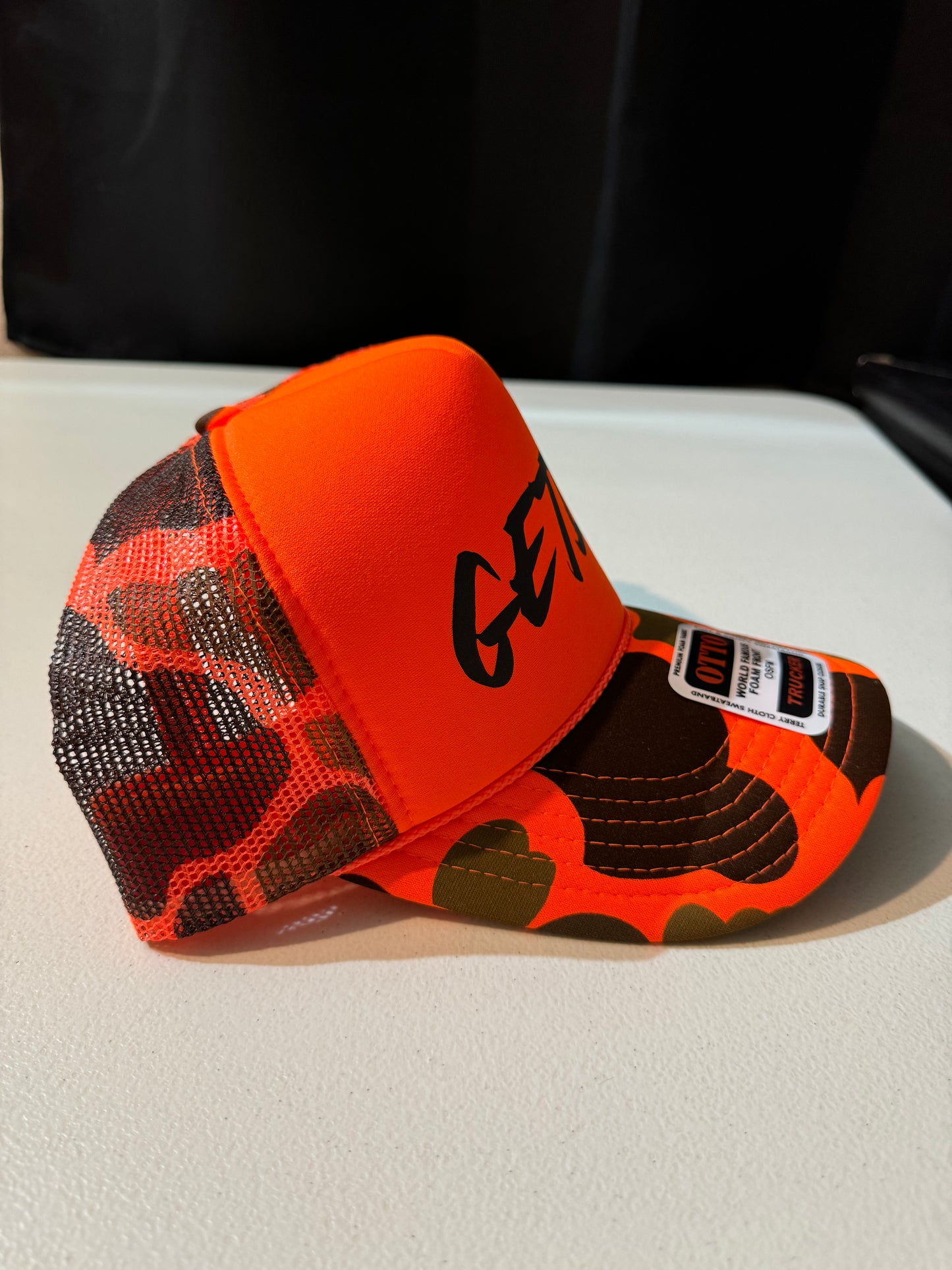 CAMO Orange Reflective Logo Trucker Hat