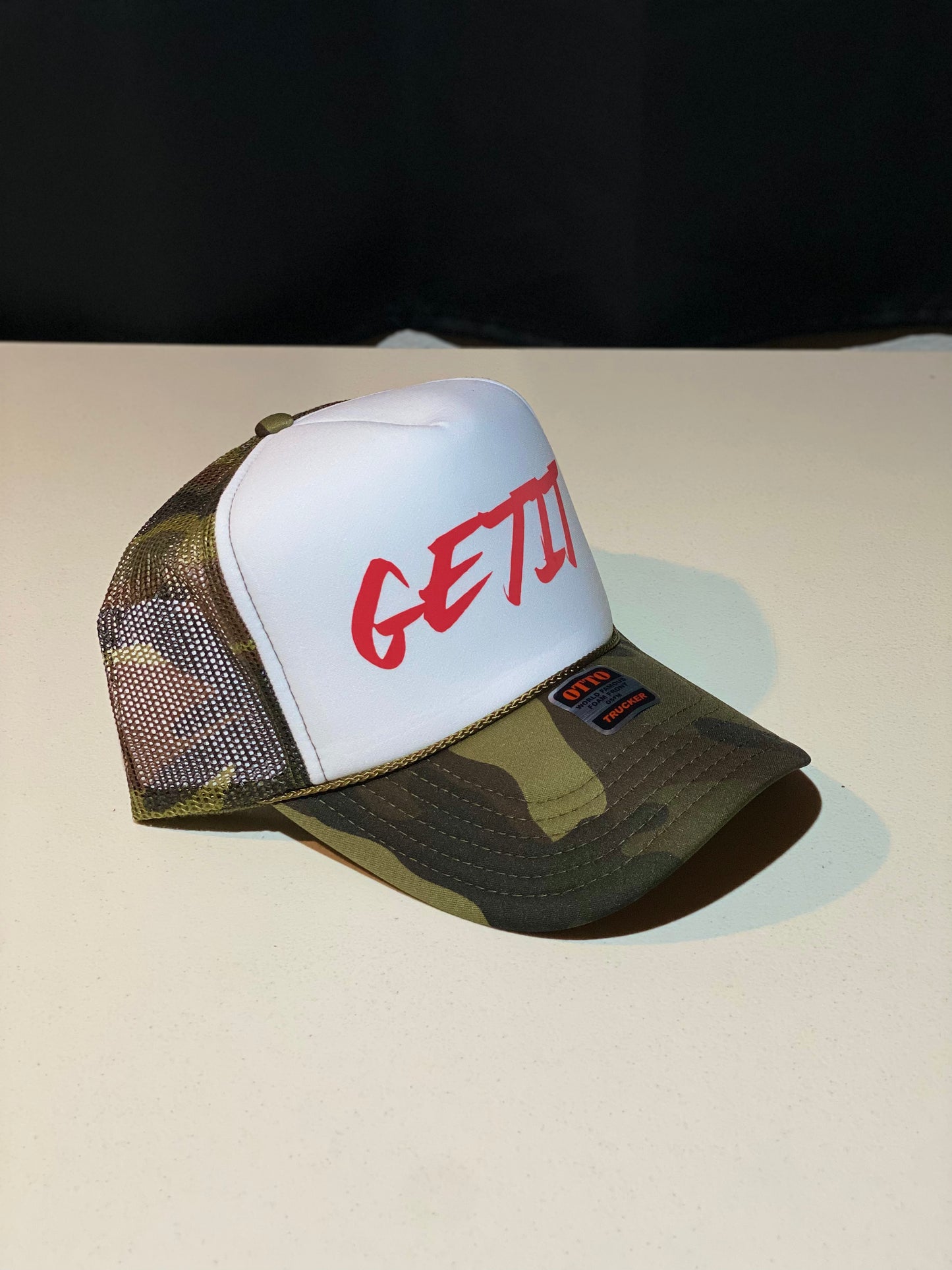 Camo/White REFLECTIVE RED GETIT Trucker Hat